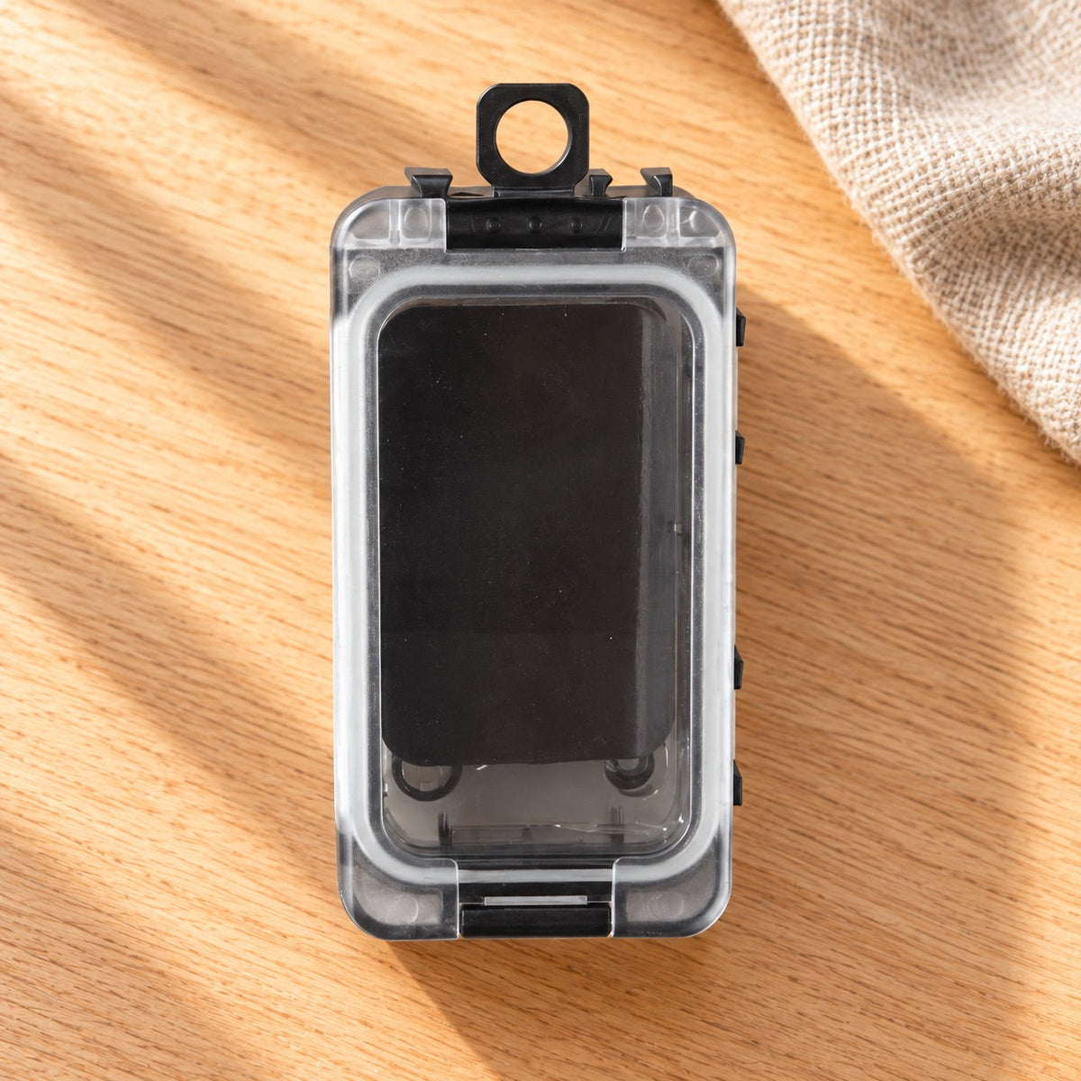 AI-styled: Compact Black-Latch Notions Box, closer view on a warm oak worktable. Styling props are not included.
