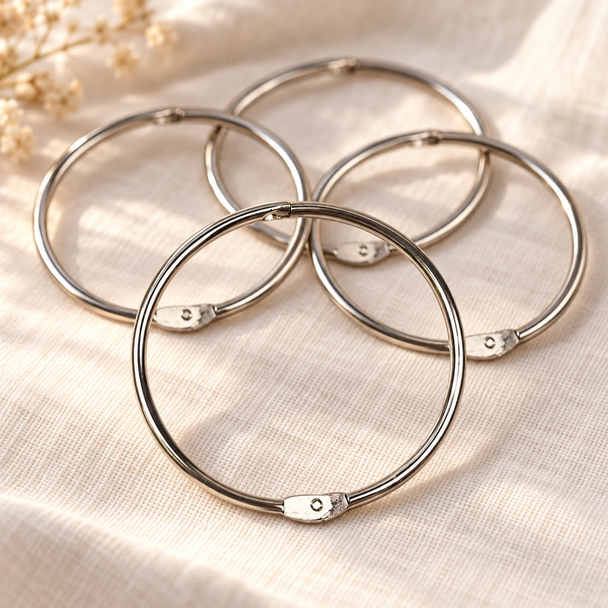 AI-styled: Floss Bobbin Storage Rings — Set of 4 — close view of the original product details. Styling props are not included.