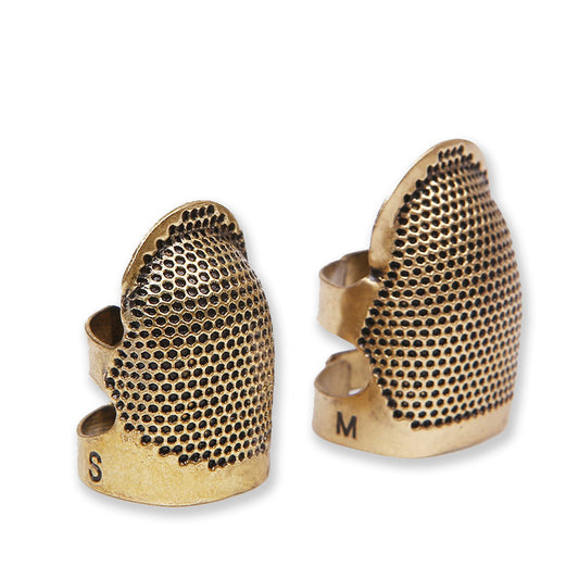 Supplier photo: Adjustable Sewing Thimbles — S & M Pair