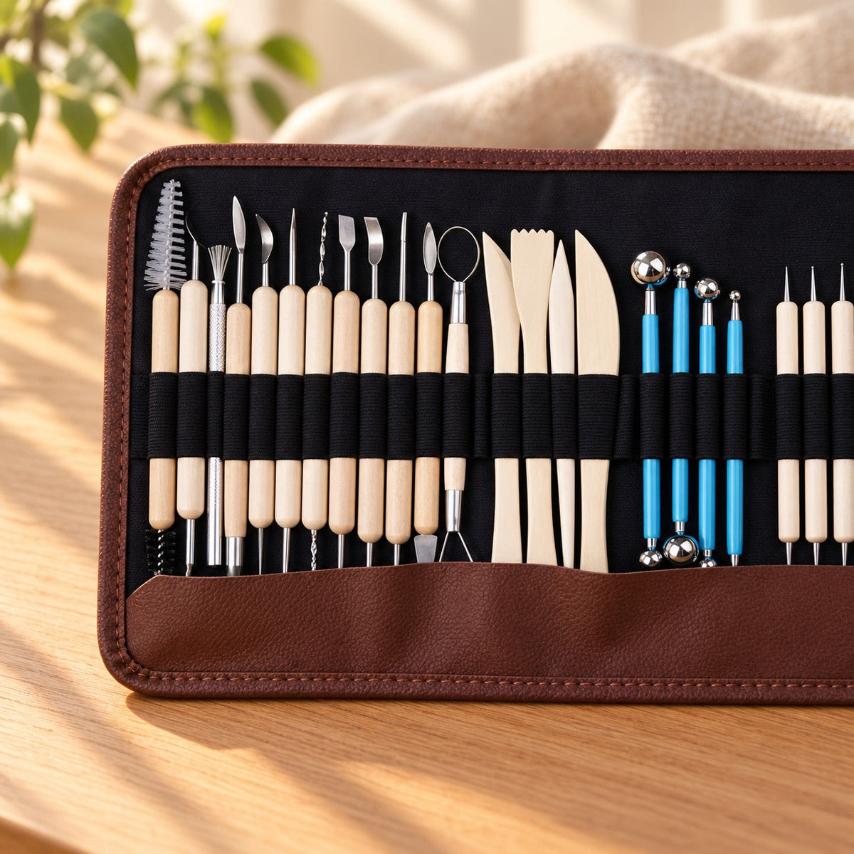 AI-styled: 37-Piece Clay Sculpting Tool Set, closer view on a warm oak worktable. Styling props are not included.