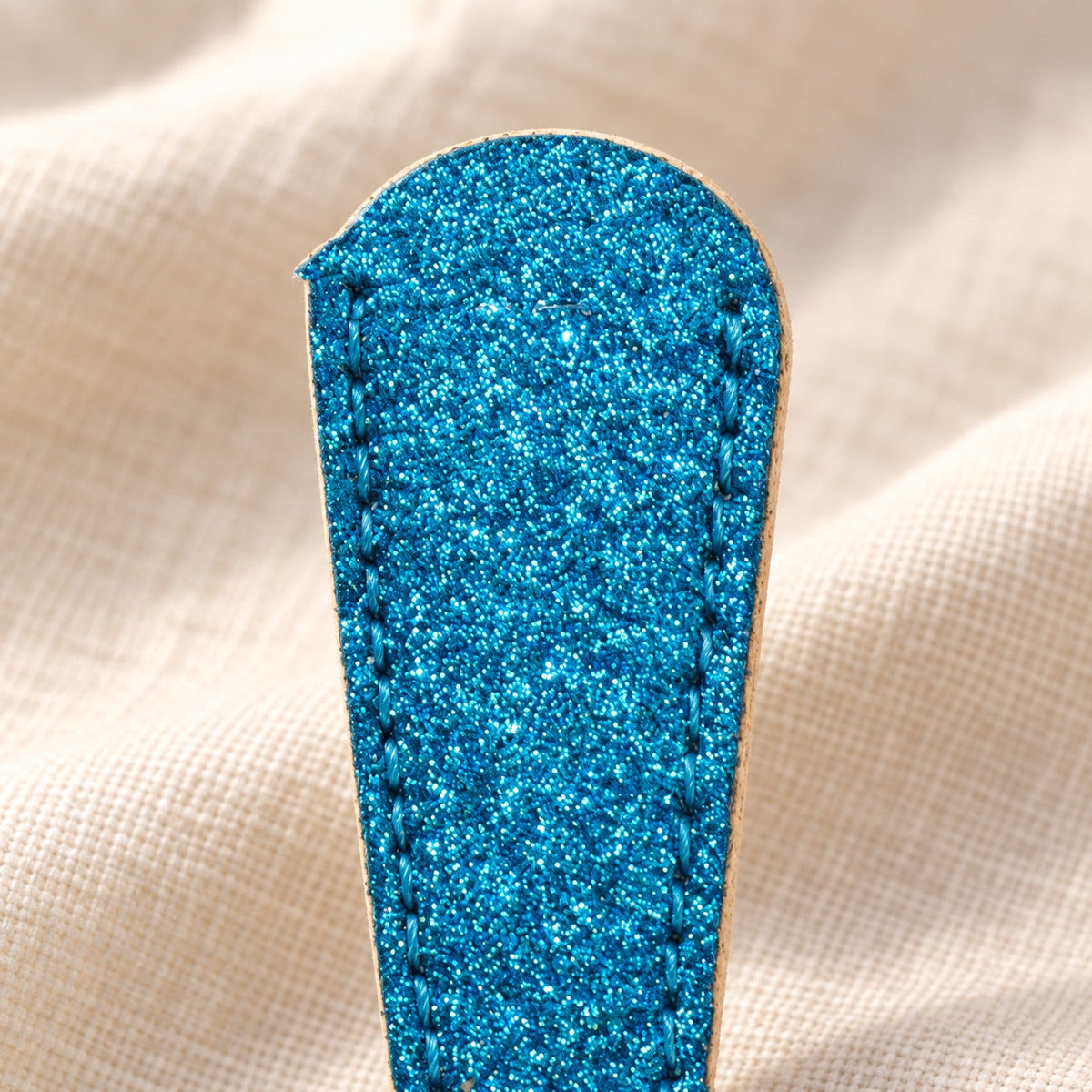AI-styled: Blue Glitter Scissor Sheath — close view of the original product details. Styling props are not included.