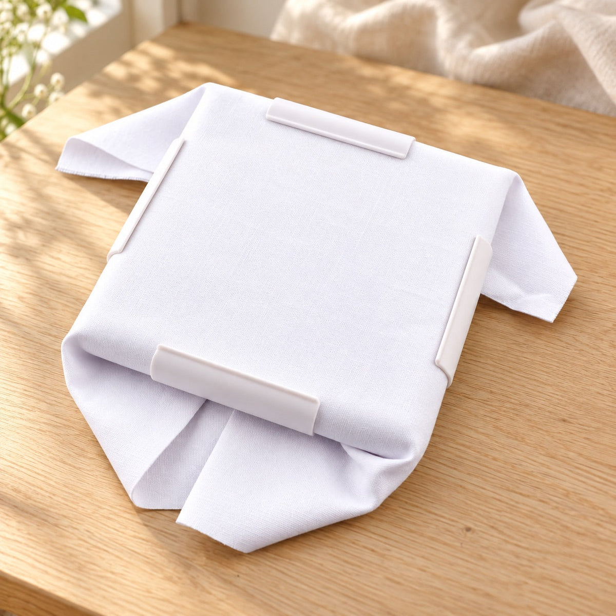 AI-styled: 8-Inch Square Embroidery Frame on a warm oak craft desk. Styling props are not included.